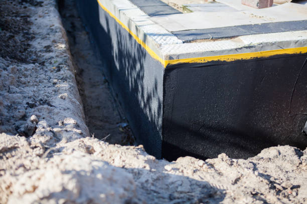Professional Waterproofing technician working in Parma, OH